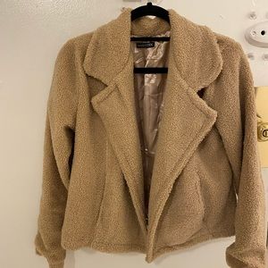 Fuzzy brown jacket.